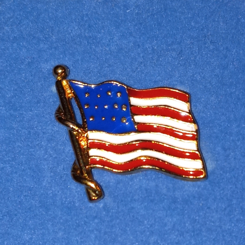 American flag lapel pin.
